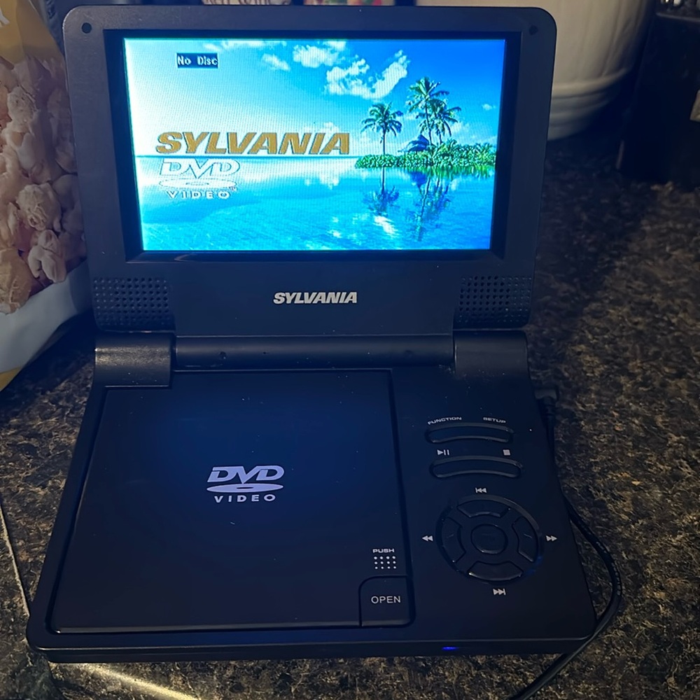 Sylvania Portable DVD Player; used frequently, still in great condition!